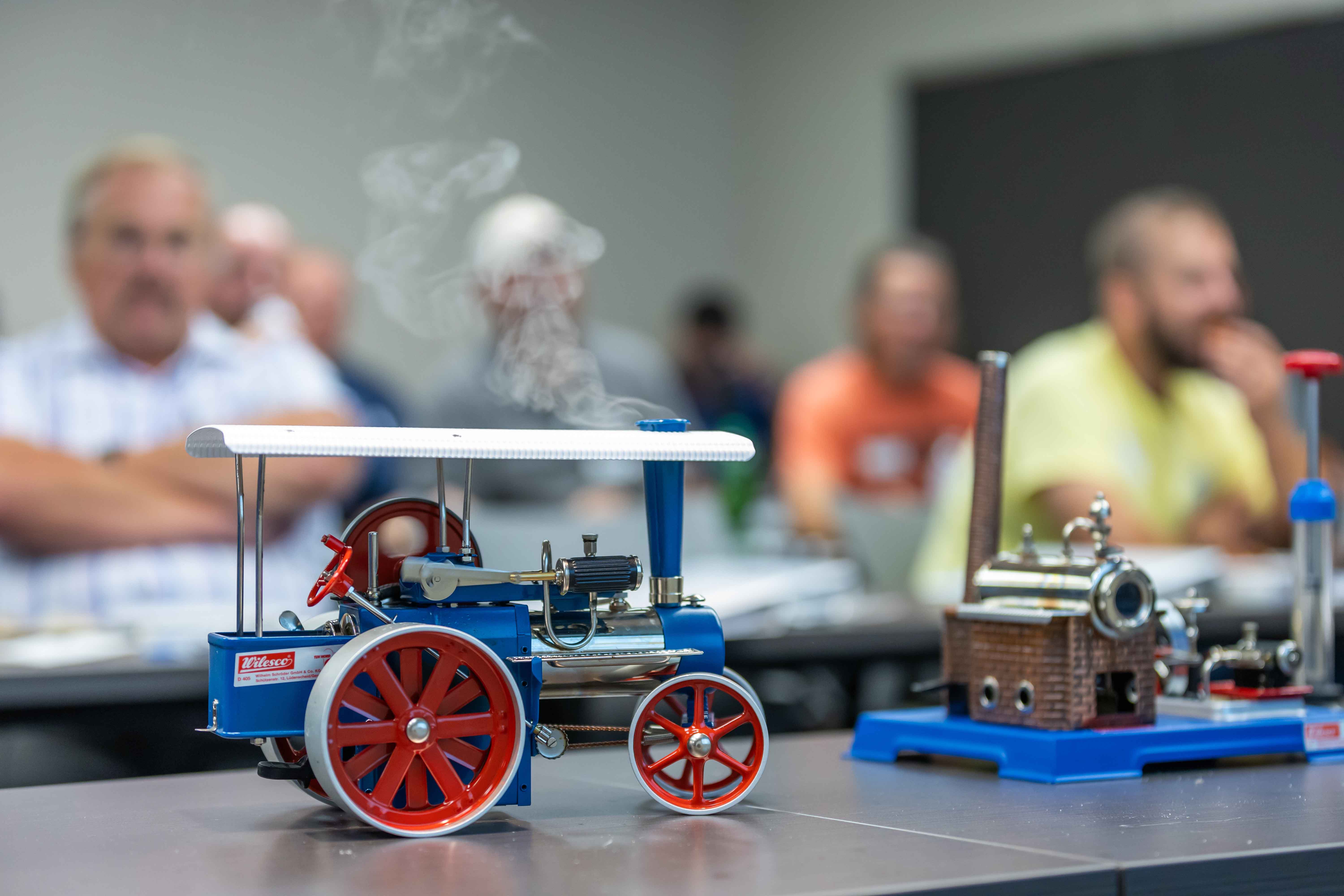 Small Steam Engine on a table smoking