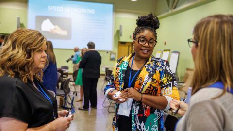 People talk at the CLD Kentucky Leadership Summit KSU 2023